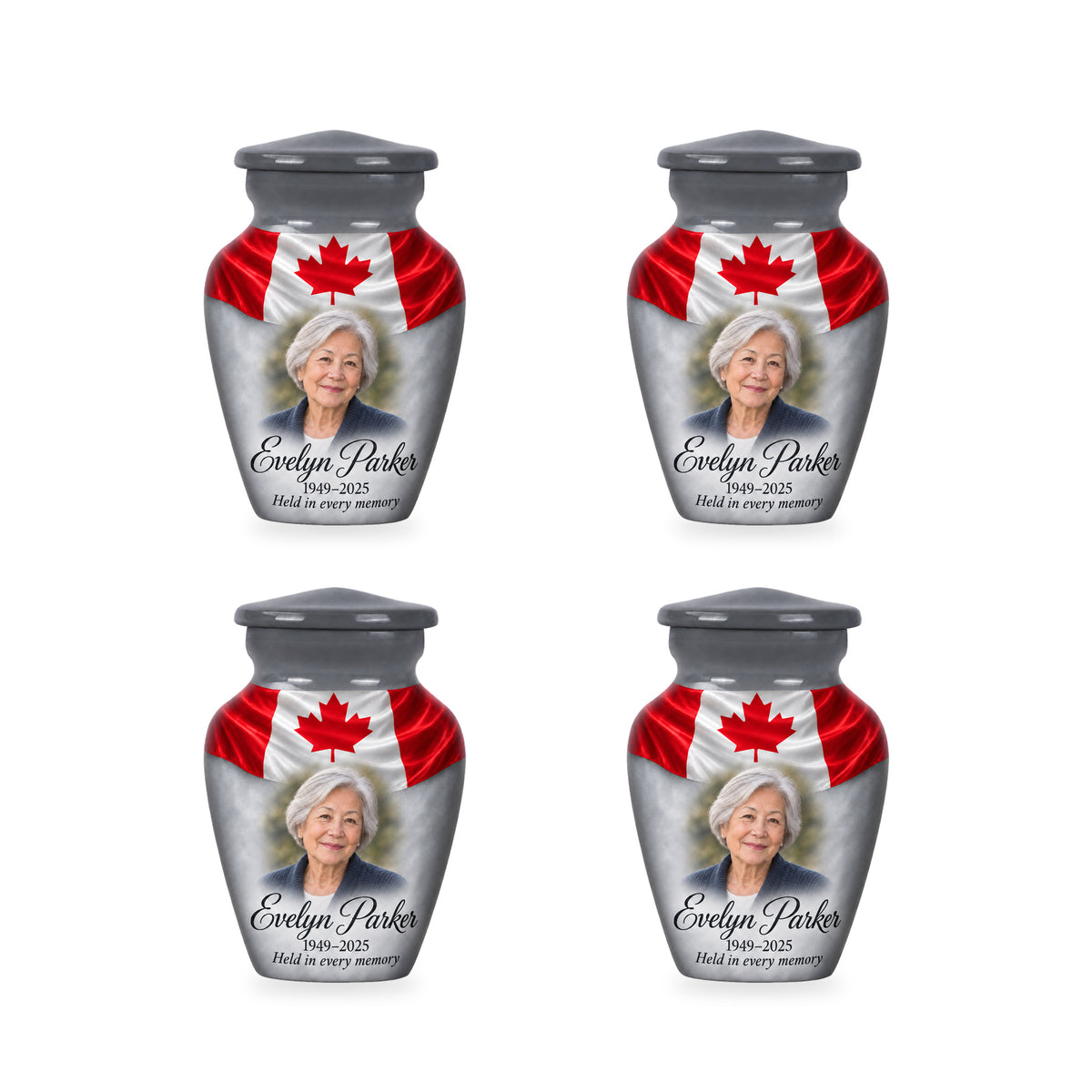 Four matching gray Canadian flag keepsake urns with sample photo and inscription.