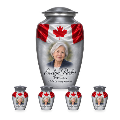 Gray adult Canadian flag urn with four matching keepsakes in proportional 10-inch and 3-inch sizes.