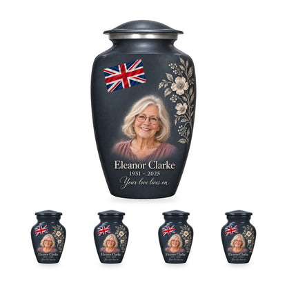 One slate gray adult Union Jack urn with four matching ringless keepsakes, showing the 10-inch and 3-inch sizes together.