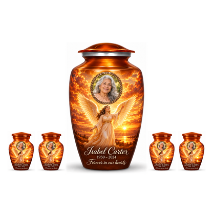 One orange adult angel urn with four matching keepsake urns and sample photo personalization on white.