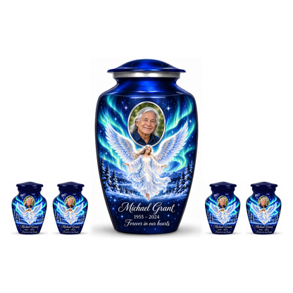 One blue adult angel urn and four matching keepsake urns with sample portraits and inscriptions on white.