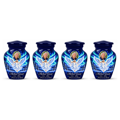 Four matching blue angel keepsake urns with sample portraits and inscriptions on white.