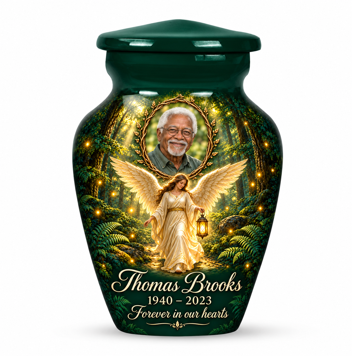 One green angel keepsake urn with a woodland angel holding a lantern and a twig framed sample portrait and sample name and dates.