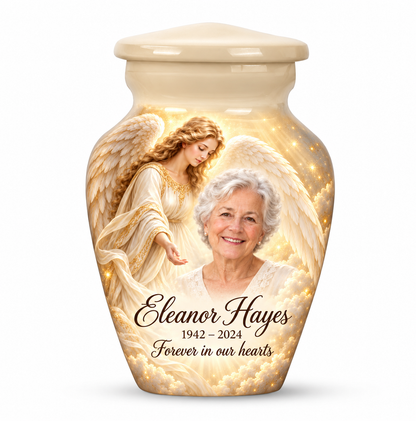 One white angel keepsake urn with a guardian angel, golden clouds and light and sample photo personalization.