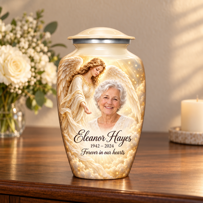White adult angel urn with a guardian angel, golden clouds and light on a memorial console.