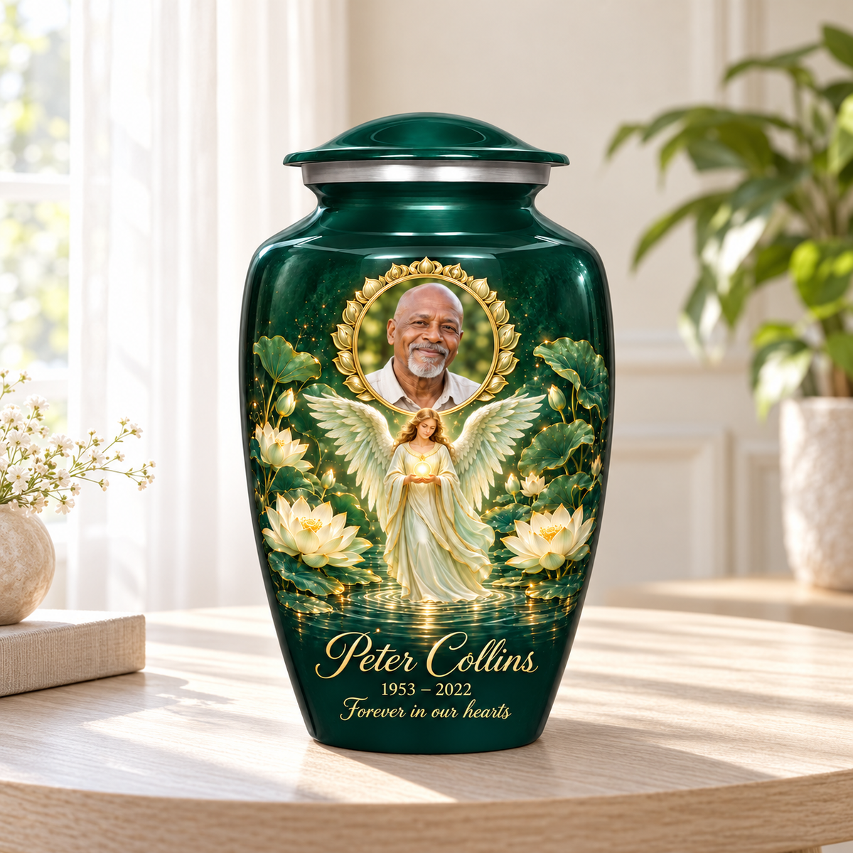 Green adult urn with an angel holding an orb above lotus water and a circular sample portrait frame, arranged in a sunlit home.