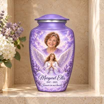 Purple adult angel urn with a praying angel, lavender flowers and clouds displayed in a columbarium niche.