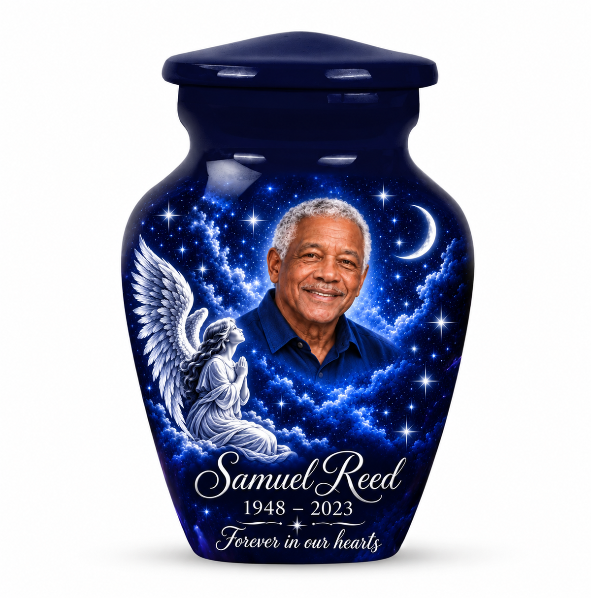 One blue angel keepsake urn with a kneeling angel, stars and crescent moon and sample photo personalization.
