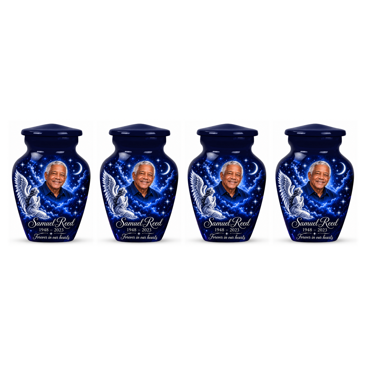 Four matching blue angel keepsake urns with a kneeling angel, stars and crescent moon on white.