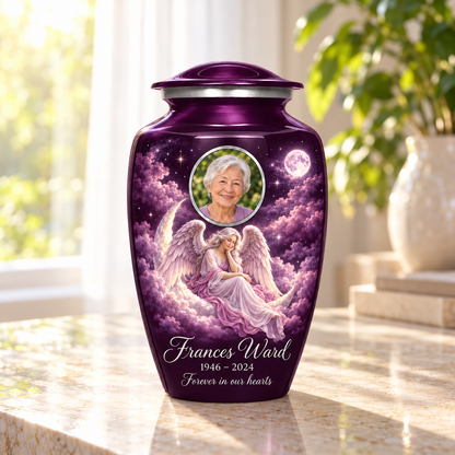 Purple adult urn with a seated angel on a crescent cloud, moonlit sky and an oval sample portrait frame, arranged in a sunlit home.