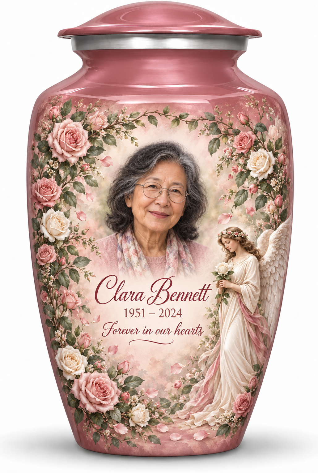 Pink adult angel urn with an angel holding a white rose amid pink flowers, a fictional sample portrait, name and tribute.