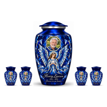 One blue adult angel urn with four matching keepsake urns and sample photo personalization on white.